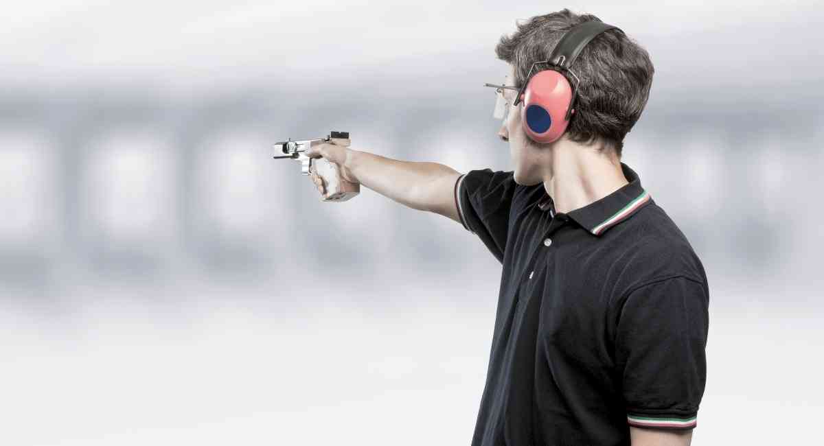 how should you hold a handgun for maximum accuracy